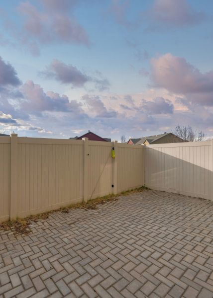 Tan PVC Fence Installation in Bowie